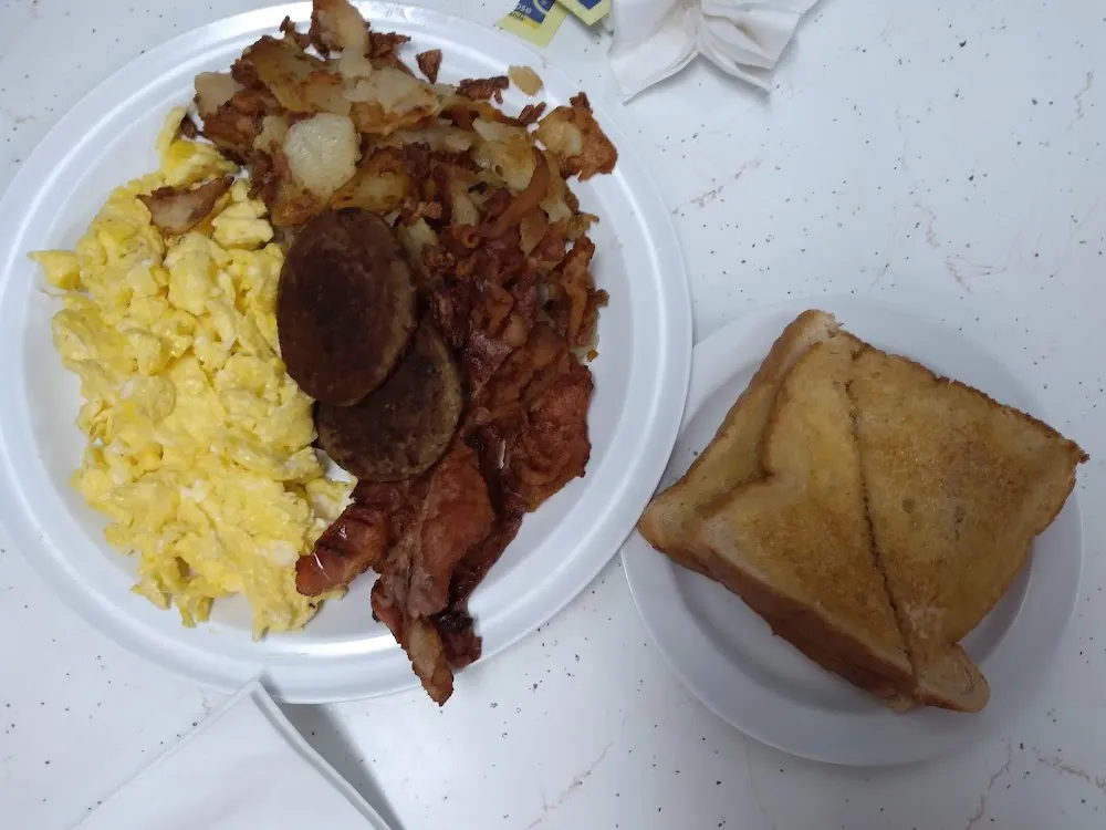 3 Scrambled Eggs Bacon Sausage and Toast